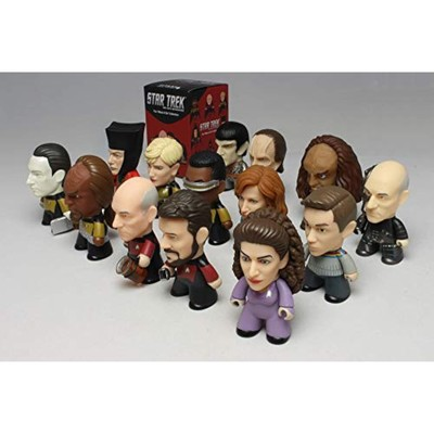 Group of Make It So Collection Star Trek figures beside a blind box
